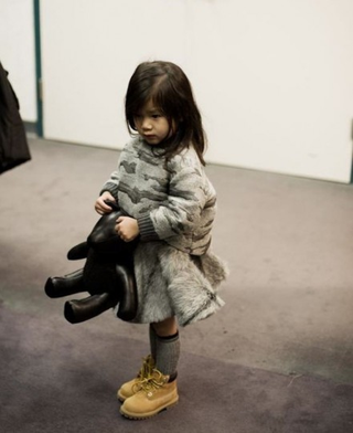 Illustration for article titled Is your wardrobe as fabulous as this small child's?